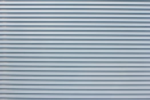 The metal has a straight line for the background.