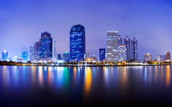 Bangkok city downtown at night with reflection of skyline, Bangkok,Thailand
