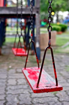 Swings, a playground for kids who like to play.