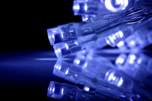 Blue LED lights closeup with reflection