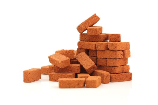 Big pile of bricks on a white background