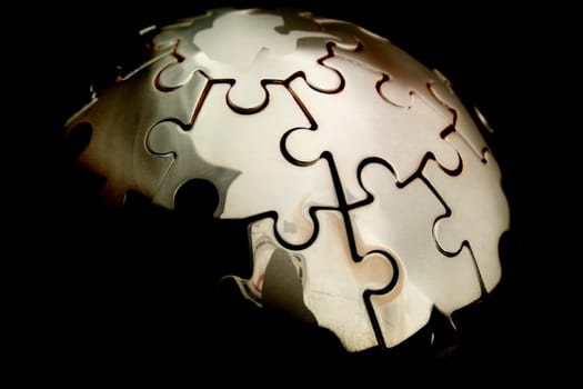 Earth jigsaw on black background