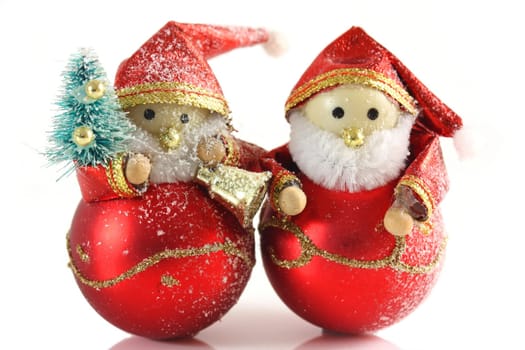 Two Father Christmas figures