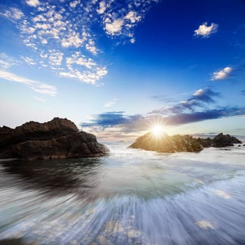 Sea and rock at the sunset. Nature composition for adv or others purpose use