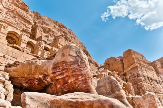 mountains of Petra with blue cloudy sky in background