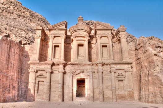 Monastery with blue sky in background high in Petra mountains