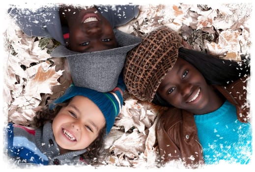 Happy family with foster children in the forest