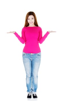 Happy , excited woman presenting copy space on her palm, isolated on white