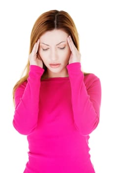 Woman with headache or problem holding her hand to the head