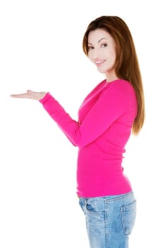 Happy , excited woman presenting copy space on her palm, isolated on white