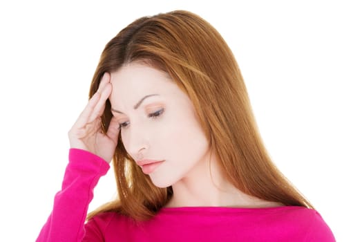 Woman with headache or problem holding her hand to the head