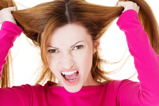 Angry beautiful woman portrait - screaming