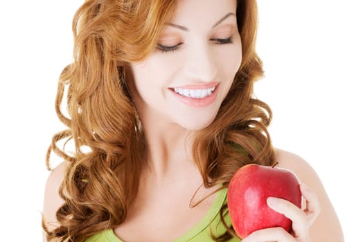 Beautiful woman with red fresh apple.