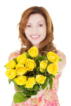 Happy woman with fresh yellow roses.