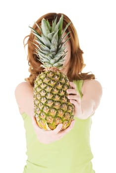 Happy woman with fresh pineapple fruit, isolated on white