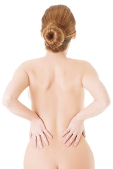 Woman with pain in her back. Isolated on white