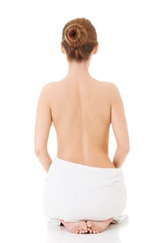 Beautiful nude woman with towel , isolated on white