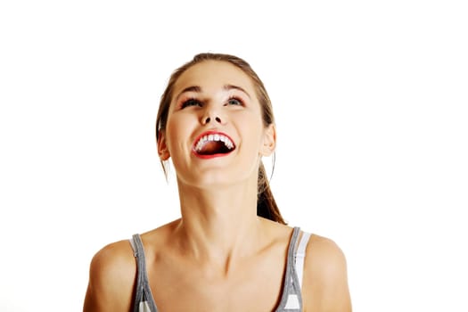 Shocked and excited woman looking up, isolated on white