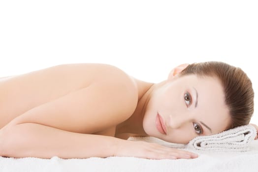 Beauty woman relaxing in spa. Isolated on white.