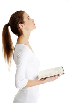 Teen woman reading book , isolated on white background