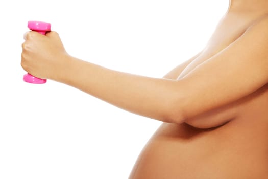 Pregnant woman holding dumbbell , isolated on white