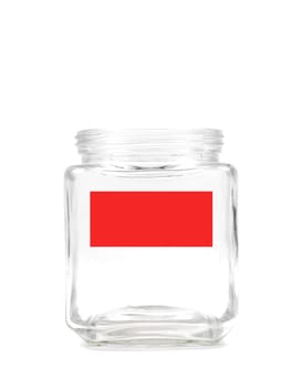 An empty jar with a blank labelisolated against a white background