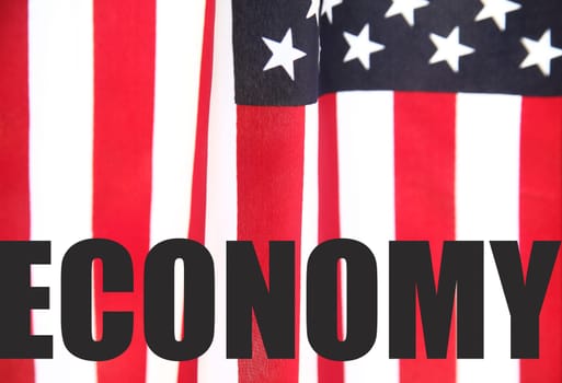 the word 'economy' on an American flag