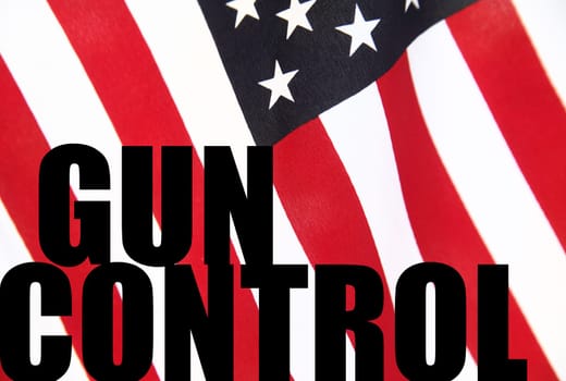 the words gun control on a USA flag background