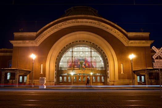 Car pass on Pacific Avenue in front of the Old Union Station