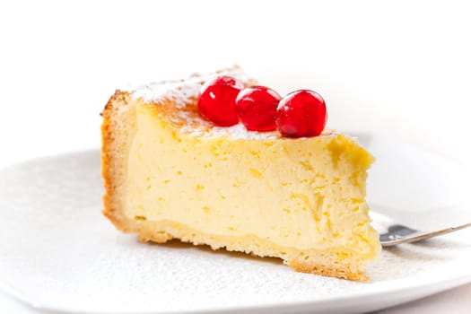 Homemade Cheesecake decorated with sweet cherries