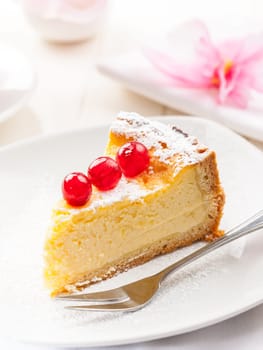 Homemade Cheesecake decorated with sweet cherries