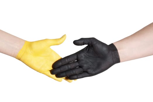 a yellow and a black painted hand handshaking, isolated