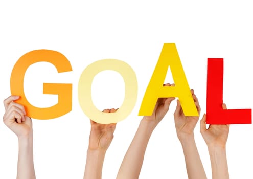 hands holding charakters which are building the word GOAL, isoated