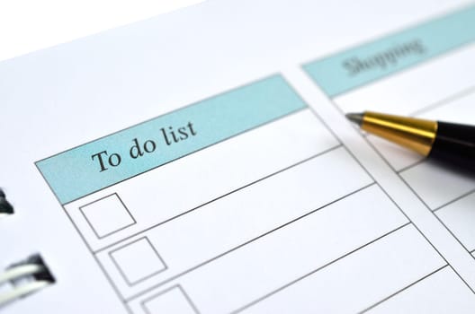 To do list on a notebook representing things to do when organizing a schedule