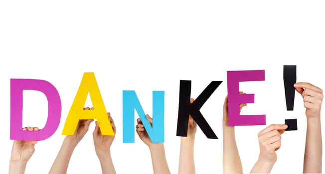 hands holding letters building the german word DANKE!, isolated