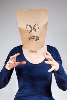 an angry looking person holding or attacking something