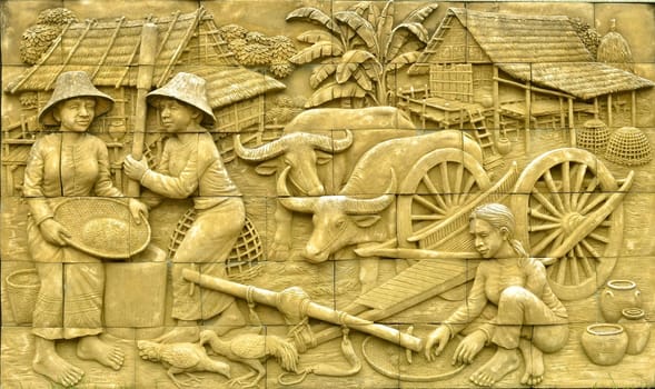 Native culture Thai stucco on the stone wall, Thailand