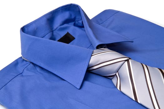 New blue man's shirt and tie isolated on white