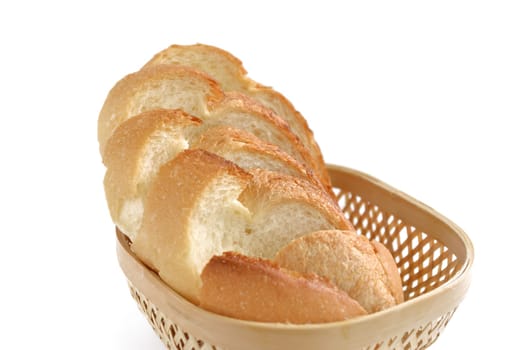 slice bread in basket on white backround