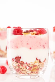Cereal dessert close-up with raspberries