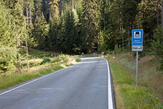 Water protection area on the Waldstein in the Fichtelgebirge in the forest with country road