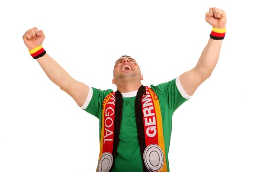 The photo shows a Germany fan who throws up his arms in strong cheering.