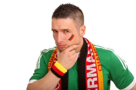The photo shows a thoughtful football fan who has taken a superior attitude
