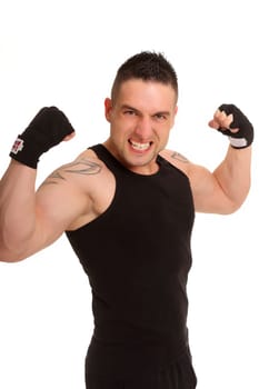 The photo shows a young man powerfully throwing his arms up and pretending to be a winner.