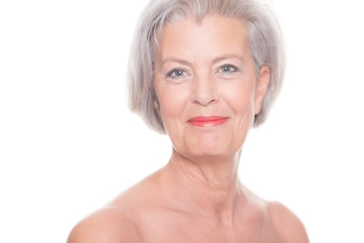 Studio shot of an elderly woman against a white background