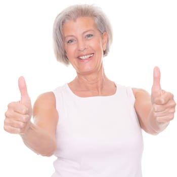 Senior woman with thumb stretched against white background