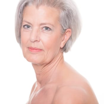 Studio shot of an elderly woman against a white background