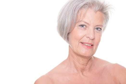 Studio shot of an elderly woman against a white background