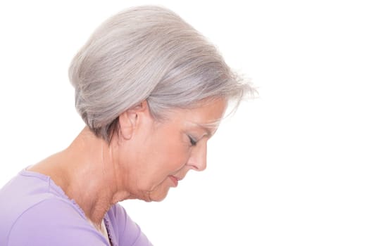 Studio shot of an elderly woman against a white background