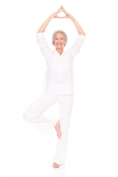Full length shot of an elderly woman against a white background